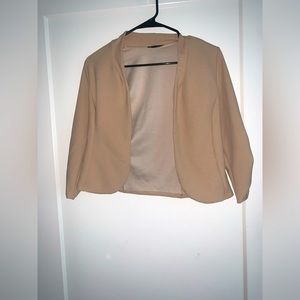 Tan cropped jacket with ruched sleeves